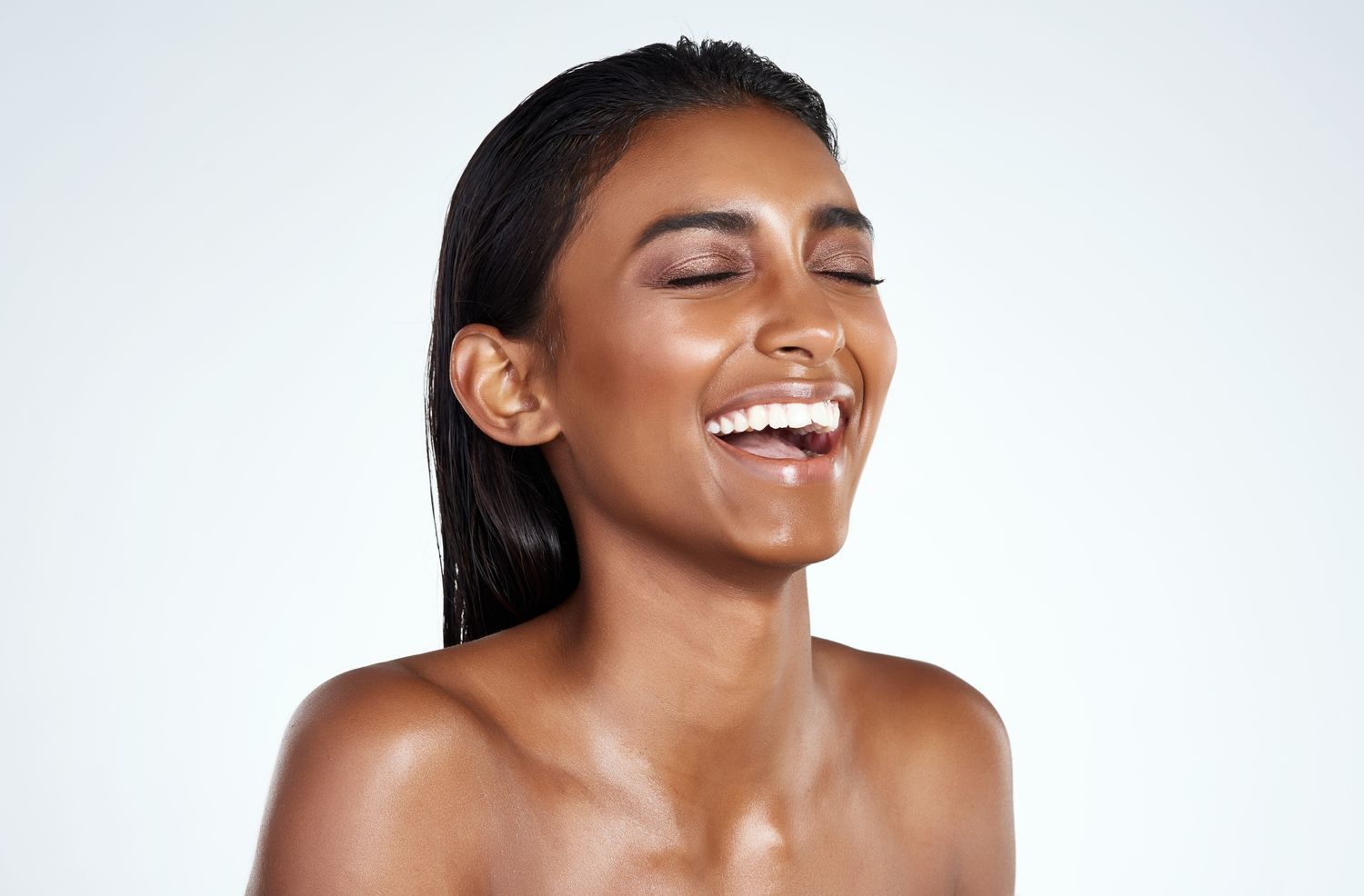 chemical peel patient model laughing with her eyes closed